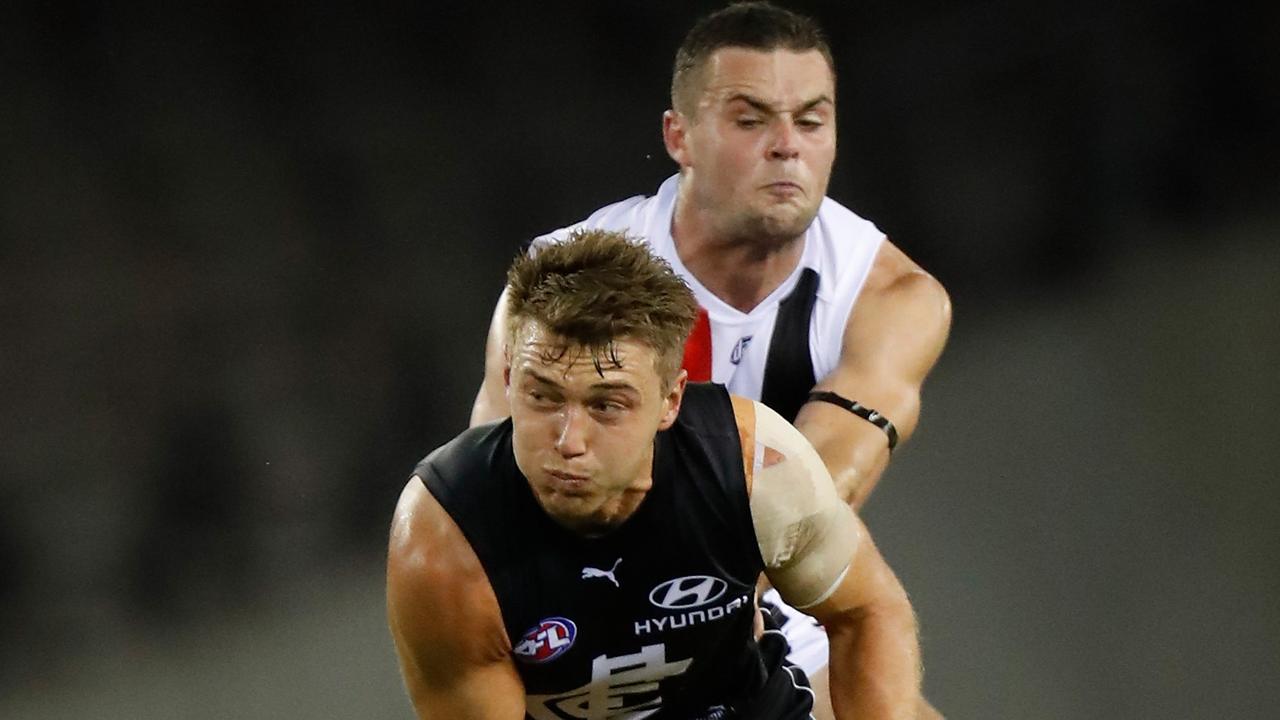 Patrick Cripps of the Blues and Brad Crouch of the Saints. Picture: Michael Willson