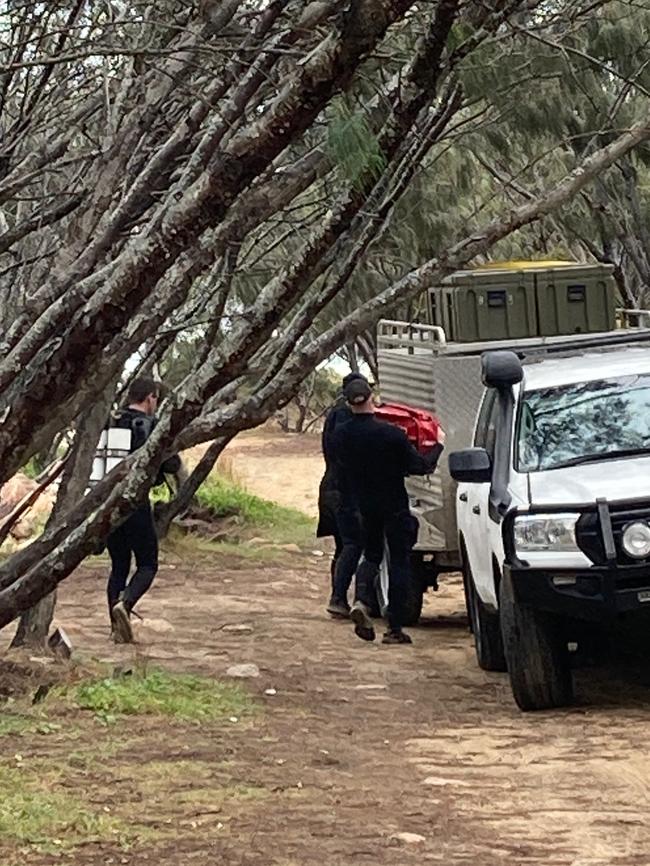 Divers return from their morning search at South West Rocks. Picture: Daniel Mills