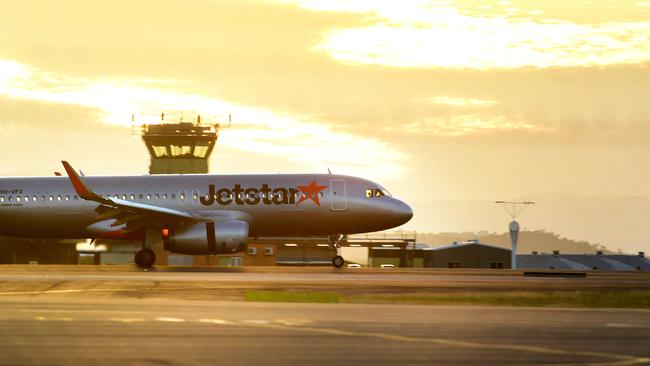 Jetstar’s first flight from Melbourne landing at Townsville Airport on Sunday. Picture: Alix Sweeney