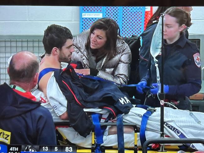 Christian Petracca on his way to hospital after an accidental knee in the ribs