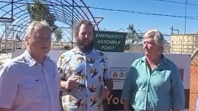 Steve Edgington, Jeffrey McLaughlin and Dr Sam McMahon touting progress on the Ali Curung Youth Centre in April 2021. The project has completely stalled. Picture: Facebook/ Steve Edgington MLA : Member for Barkly