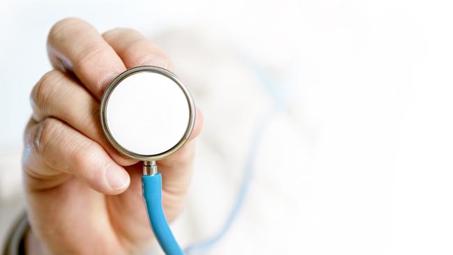 Doctor holding a stethoscope. image: istock