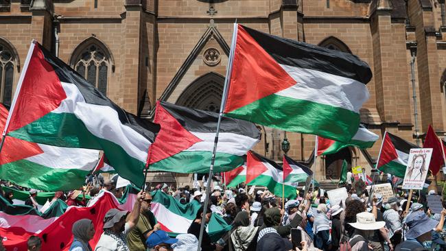 Thousands marched past St Mary’s Cathedral. Picture: NCA NewsWire / Flavio Brancaleone