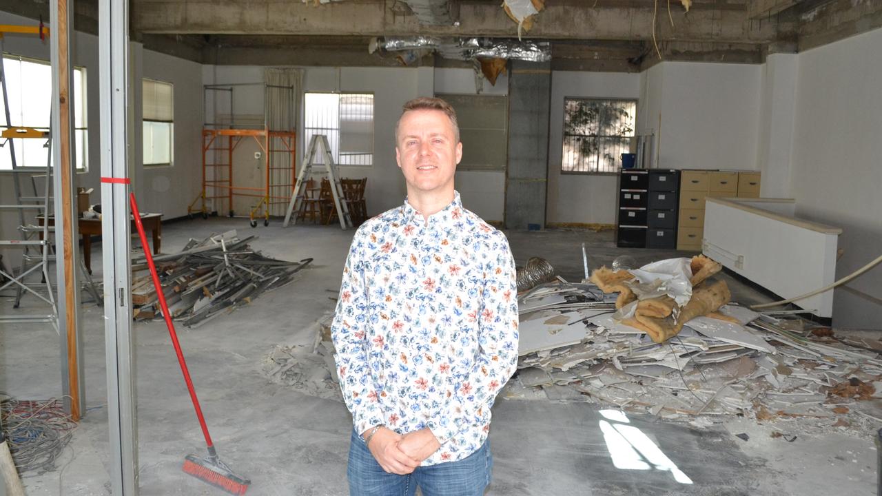 Chris Christensen in the old CBD bank building he is refurbishing for a cafe, events space and business premises.