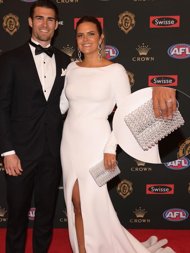 Tiffany Sayers: The partner of Bulldog Easton Wood added some bling to simple white with a striking clutch. Photo: Quinn Rooney/Getty Images