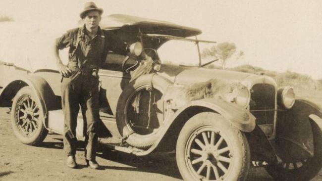 Snowy” Rowles stands beside James Ryan’s Dodge, taken by Arthur Upfield. Picture: National Library of Australia