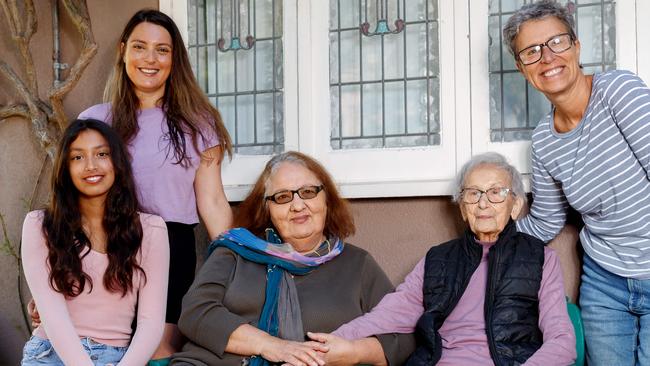 Maria Spathis (centre left) with her daughter Evonne and her granddaughter Maria Campo Romero and neighbours Aliki Coroneos (centre right) and Chrysanthi Coroneos in Maroubra, Sydney on Friday, October 6, 2023. Both Maria and Aliki have lived  in the same Maroubra properties since the 1960s. Picture: Nikki Short