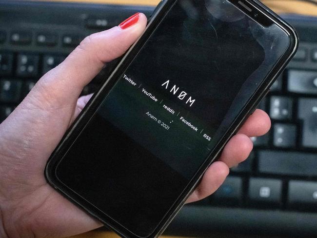 The ANoM app appears on the screen of a smartphone in Paris, on June 8, 2021. - Some 250 people were arrested in Sweden and Finland in the global sting on organised crime, authorities said on June 8, 2021, using phones planted by the US FBI, law enforcement officers were able to read the messages of global underworld figures in around 100 countries as they plotted drug deals, arms transfers and gangland hits on the compromised ANOM devices. (Photo by Olivier MORIN / AFP)