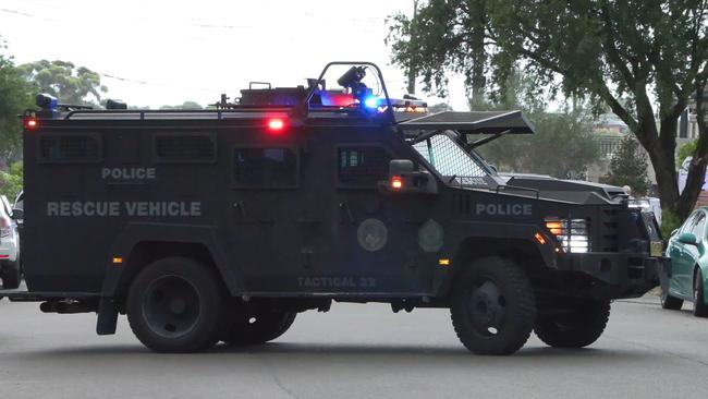 Heavy police rescue vehicles were used to block the street. Picture: News Media Network