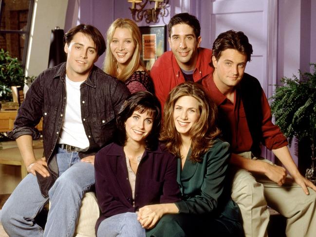 The cast of Friends in Monica's apartment in New York.