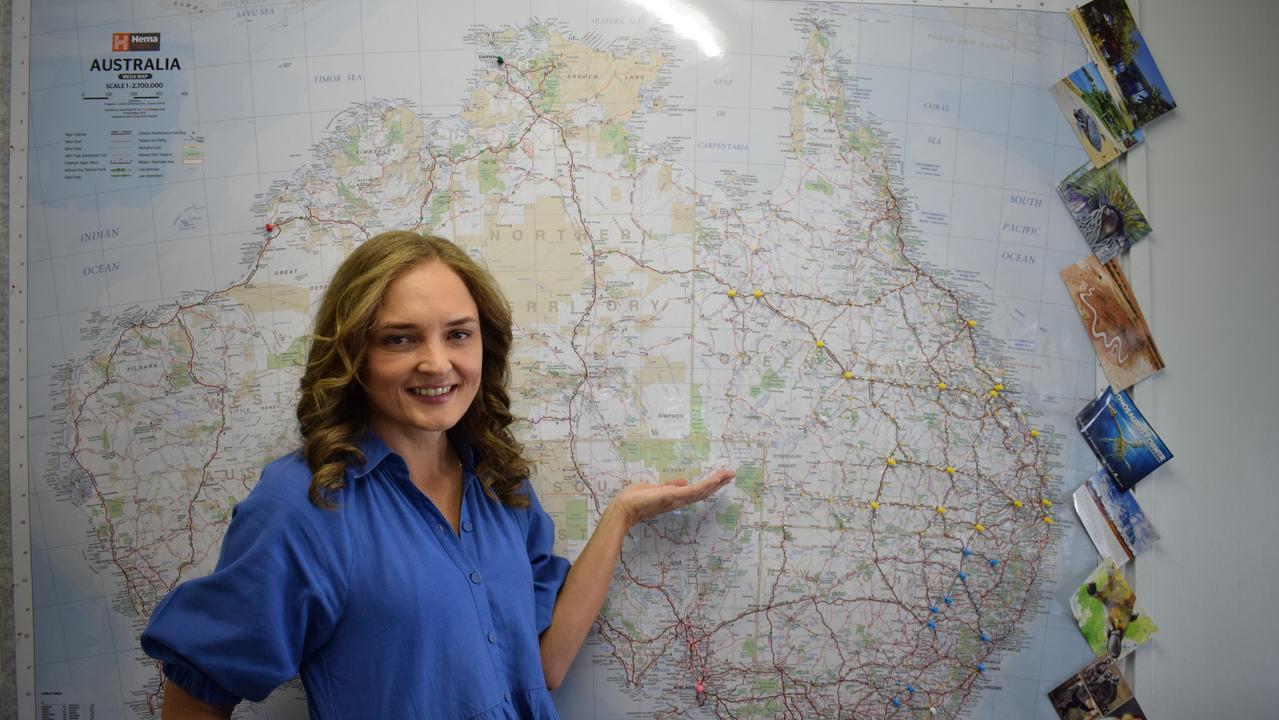 Director of Rural and Remote Development Consultants Kalair McArthur in front of a map of all the places she has been with her business. Picture: Aden Stokes