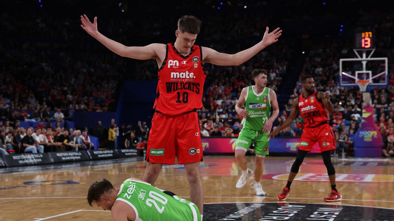 PERTH, AUSTRALIA - SEPTEMBER 20: Ben Henshall of the Wildcats stands over Nathan Sobey of the Phoenix during the round one NBL match between Perth Wildcats and South East Melbourne Phoenix at RAC Arena, on September 20, 2024, in Perth, Australia. (Photo by Will Russell/Getty Images)