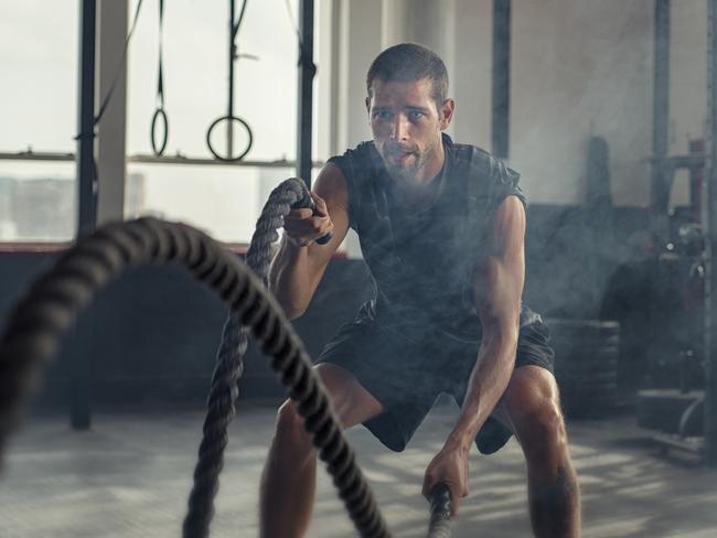 Avoid being one-dimensional: try using battle ropes. Training in a more athletic way gives you a more athletic physique. Picture: istock