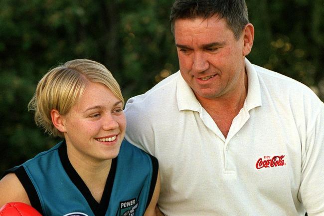 12/07/2002. Former footballer Greg Phillips with daughter Erin in 2002.