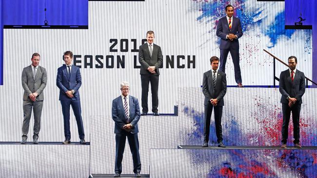 New AFL life members Eddie Betts, Chris Donlon, Mike Fitzpatrick, Rex Hunt, Steve Johnson, Jordan Lewis, Michael Long, Andrew Mackie, Kade Simpson and Shaun Ryan on stage during the 2018 AFL premiership season launch.