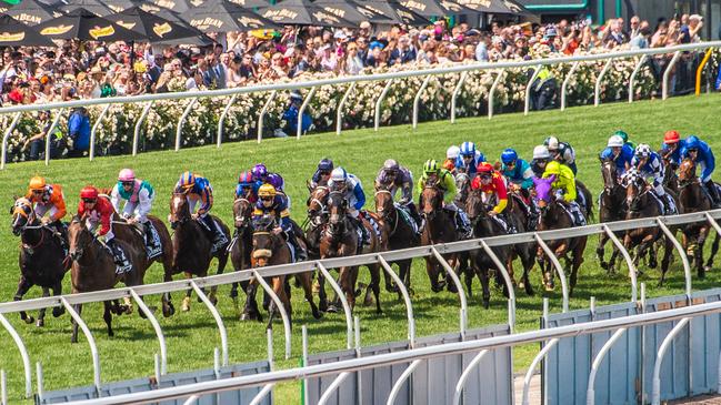 Cross Counter, in the red cap at the back of the field, was quietly ridden before his late burst. Picture: Jason Edwards