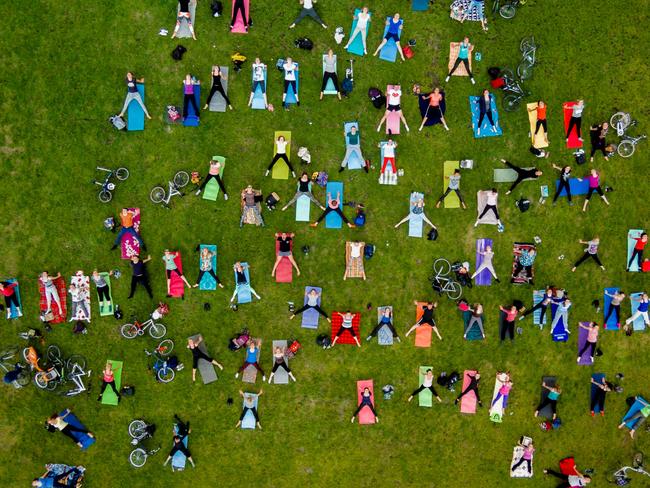 “People on mass yoga exercise in the central park of Vilnius.” Picture: Karolis Janulis, Lithuania, Shortlist, Open People, 2016 Sony World Photography Awards