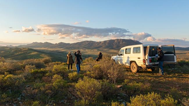 Beautiful weather, no overseas travel and nervousness about snap interstate border closures has seen holiday-makers flock to caravan and camping sites as well as cabins and holiday homes. Pictured is Rawnsley Park Station in the Flinders Ranges. Picture: SATC