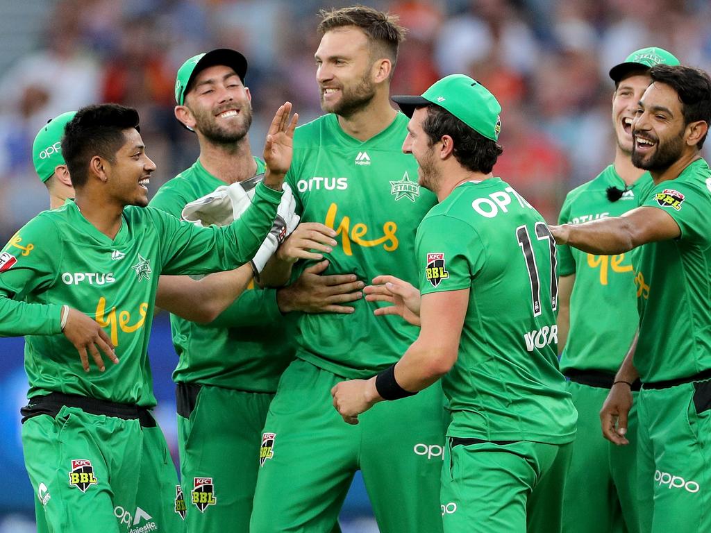 Jackson Coleman is congratulated by teammates after dismissing Mitchell Marsh.