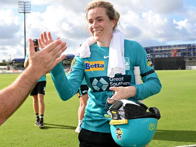 MACKAY, AUSTRALIA - OCTOBER 18: Georgia Redmayne of the Heat comes from the field after scoring 98 runs not out during the Women's Big Bash League match between the Brisbane Heat and the Melbourne Renegades at Great Barrier Reef Arena, on October 18, 2022, in Mackay, Australia. (Photo by Bradley Kanaris/Getty Images)