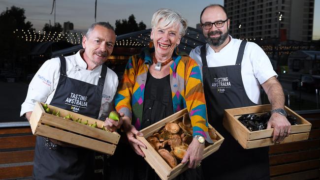 Tasting Australia festival director Simon Bryant, with event stars Maggie Beer and Paul Baker, holding SA produce Gumeracha Figs, Porcini Mushrooms and West Coast Mussles in the Town Square Kitchen. Picture: Mark Brake.