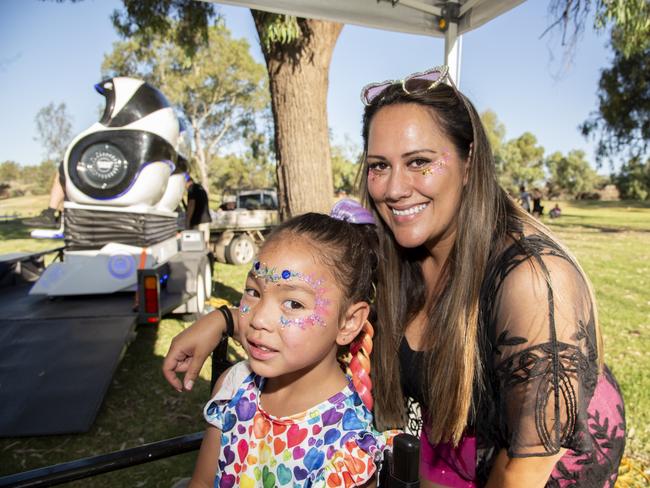 Calla Gifkins and Hallie Lasmana enjoying the Little Glitter Shack at Mildura's NYE celebrations. Picture: Noel Fisher