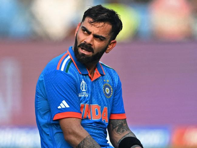 India's Virat Kohli reacts during the 2023 ICC Men's Cricket World Cup one-day international (ODI) match between India and Sri Lanka at the Wankhede Stadium in Mumbai on November 2, 2023. (Photo by Punit PARANJPE / AFP) / -- IMAGE RESTRICTED TO EDITORIAL USE - STRICTLY NO COMMERCIAL USE --