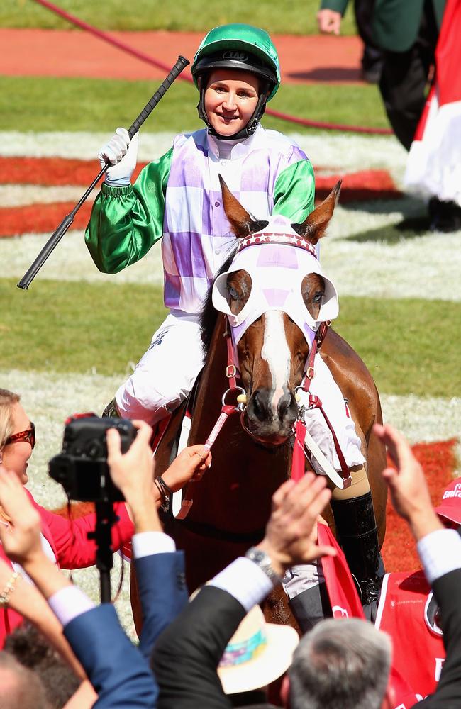 Michelle Payne celebrates winning the 2015 Melbourne Cup aboard Prince of Penzance. Picture: Getty