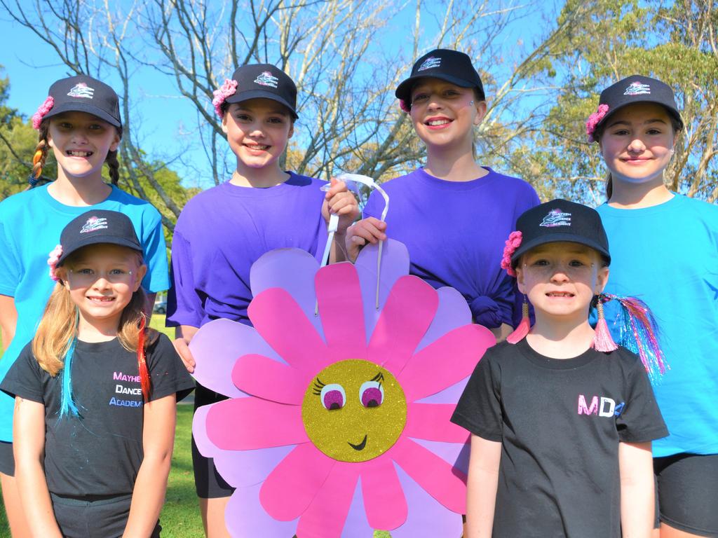 At the 2023 Grand Central Floral Parade are (from left) Jasmine Freeman, Summer Smith, Abbie Logan, Savannah Petlzer, (front from left) Hayley Freeman and Libby Kennard from Mayhem Dance Academy. Picture: Rhylea Millar