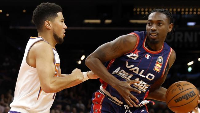 Robert Franks backs down Devin Booker. Picture: Chris Coduto/Getty