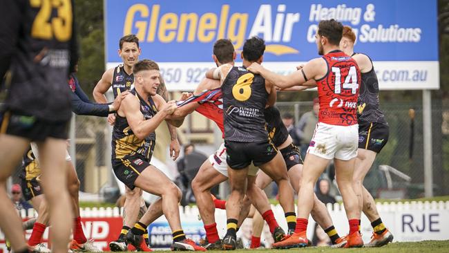 Norwood defender Alex Georgiou gets some attention from the Tiger pack at the Bay on Sunday. Picture: Mike Burton/AAP