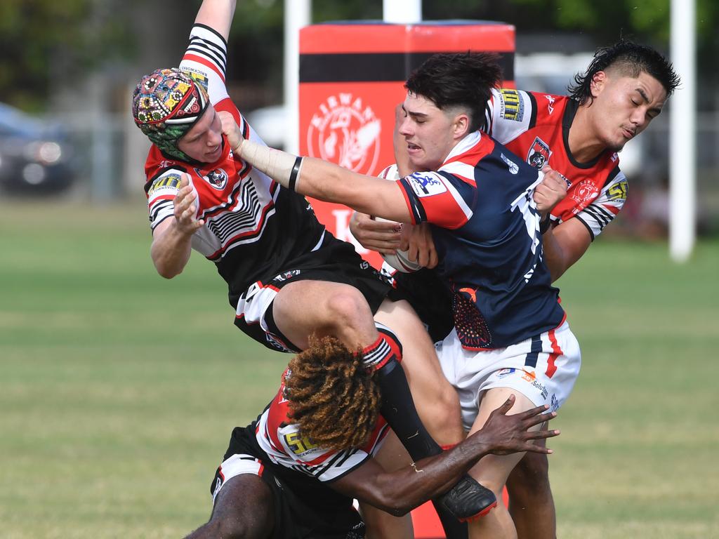 Aaron Payne Cup clash between Kirwan High Bears and St Patrick's College at Kirwan. Bears Harley Taylor, Dudley Dotai and Mia Pua'avase try and stop St Patrick's Bailey Jeffs. Picture: Evan Morgan