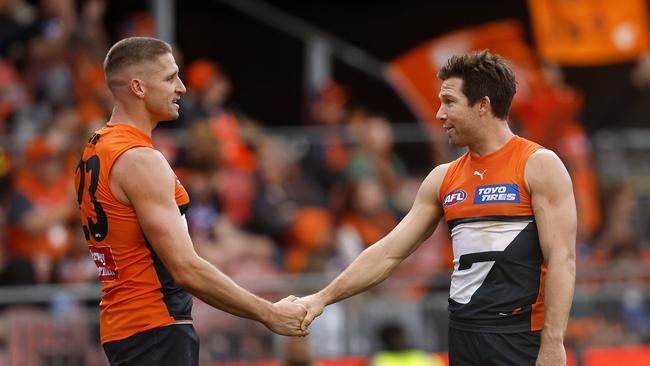 Toby Greene congratulates Jesse Hogan after one of his 69 goals this season. Picture: Phil Hillyard