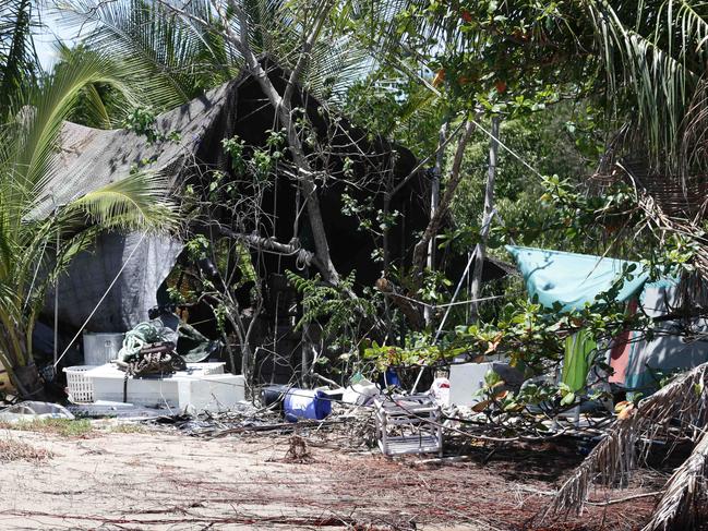 Itinerant squatters have been camping illegally on beachfront land on Trinity Bay for months, on land owned by Cairns Airport. Surrounded by thick mangrove vegetation, the only way to access the camp is by boat. Picture: Brendan Radke