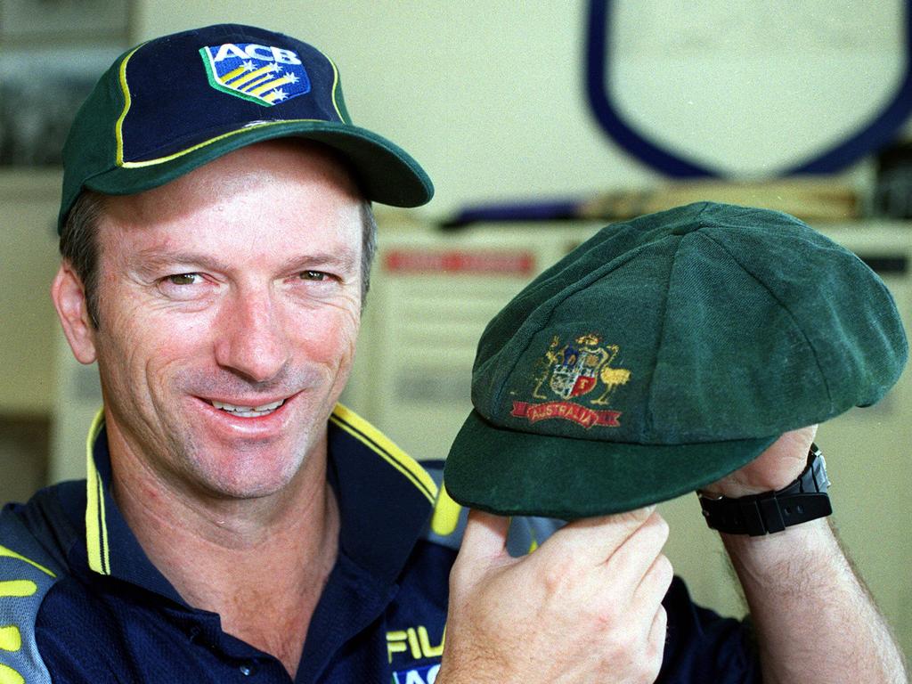 Cricketer Steve Waugh and his repaired Australian baggy green cricket cap in 2002.