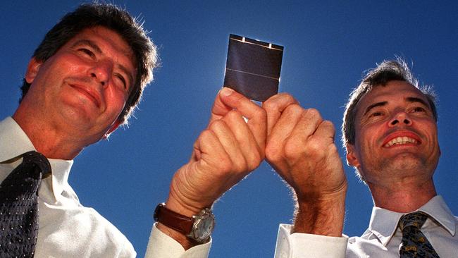 Australia Prize winners Martin Green, left, and Stuart Wenham with their buried-contact solar cell developed and built at the University of NSW in February 1999. 