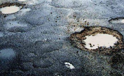 Patch work of pot holes and repair work along Lennox Heads Park Lane.