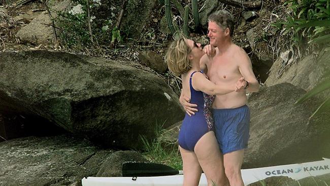 US President Bill Clinton and wife Hillary dance on the beach of Megan Bay, St. Thomas in 1998. Picture: AFP/Paul J. Richards