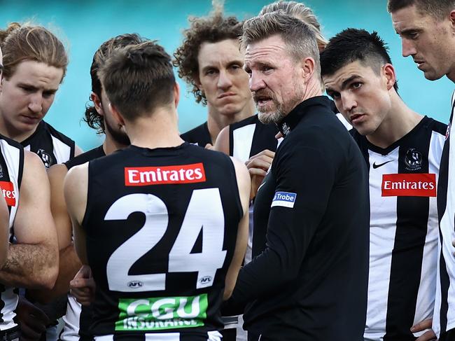 SYDNEY, AUSTRALIA - MAY 15: Magpies head coach Nathan Buckley talks to his team after losing the round 9 AFL match between the Sydney Swans and the Collingwood Magpies at Sydney Cricket Ground on May 15, 2021 in Sydney, Australia. (Photo by Cameron Spencer/Getty Images)