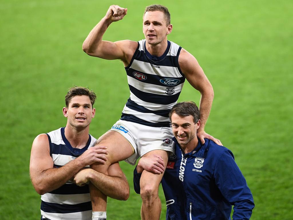 Joel Selwood gets chaired off by the man whose record he broke. (Photo by Daniel Carson/AFL Photos via Getty Images)