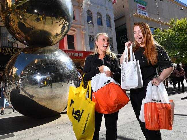 Emma Rothe - 25yrs and Jessica Mayes - 25yrs (0433 375 182) pose for a photo in Rundle Mall, Adelaide on Saturday the 14th of December 2019. Christmas shopping in the mall.  (AAP/ Keryn Stevens)