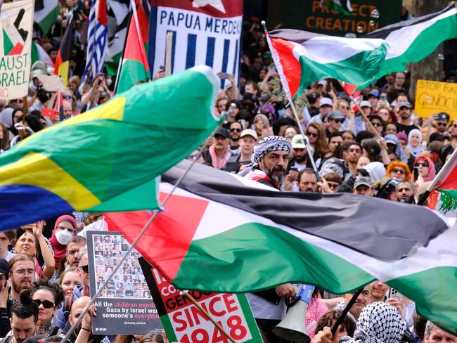 Pro-Palestinian protesters gather at a rally in Melbourne on Sunday, October 6, 2024.