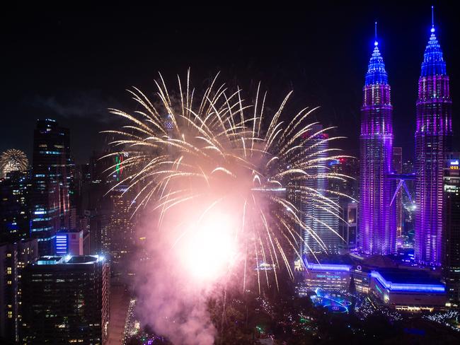 This photograph shows fireworks over the Petronas Twin Tower during the New Year celebration in Kuala Lumpur on January 1, 2025. Picture: AFP