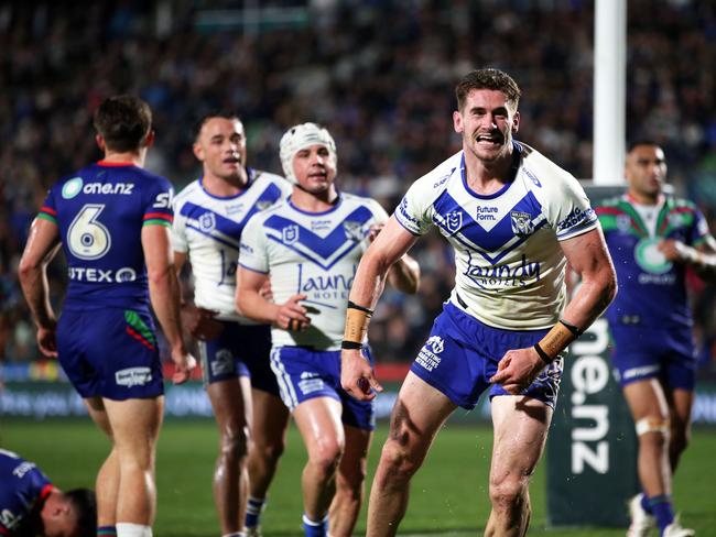Hayes celebrates scoring his first NRL try.