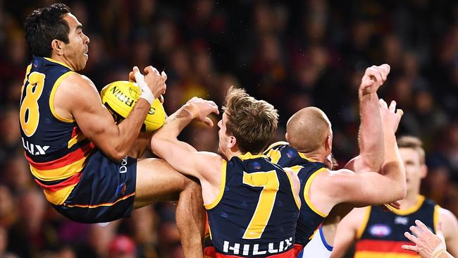 Crows star Eddie Betts takes a hanger against North Melbourne last year. Picture: Mark Brake/Getty Images