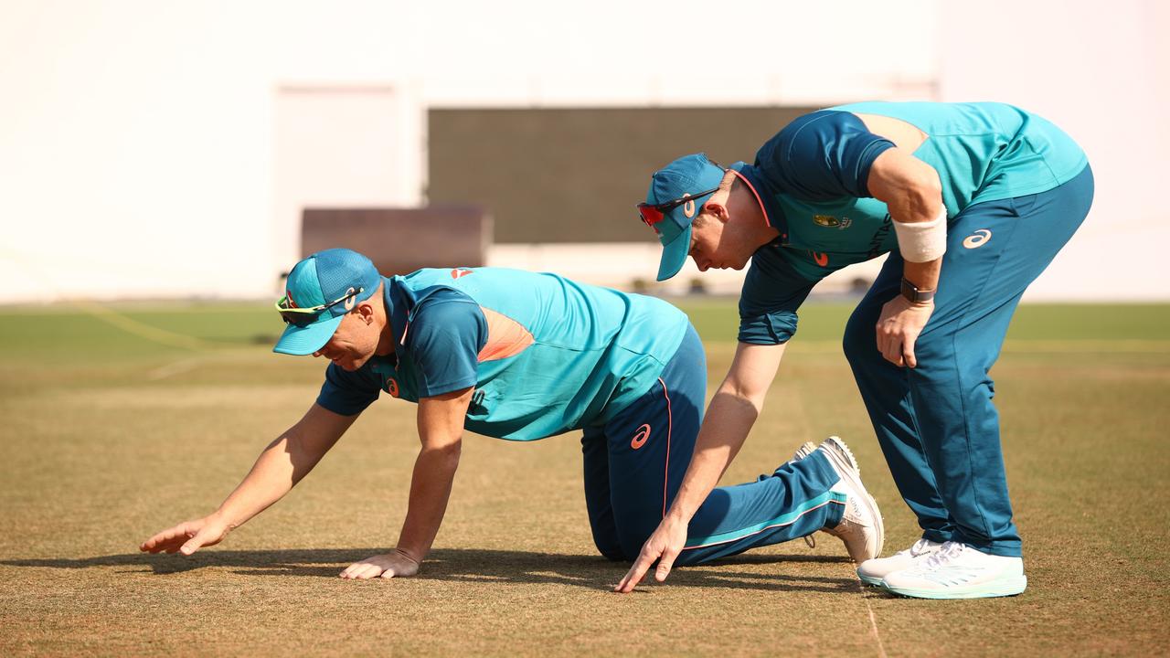 Steve Smith and David Warner of Australia check the pitch during a training session at Vidarbha Cricket Association Ground in Nagpur, India. (Photo by Robert Cianflone/Getty Images)