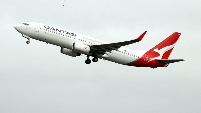 Qantas pilots have been warned after strange interference on their VHF devices was reported. Picture: Saeed KHAN / AFP