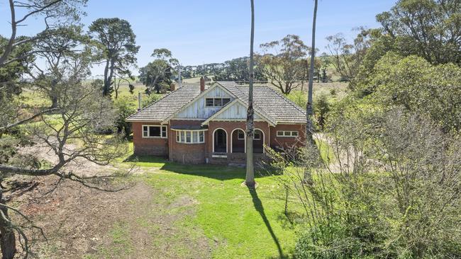 A circa-1940s brick homestead stands at the Mount Moriac farms.