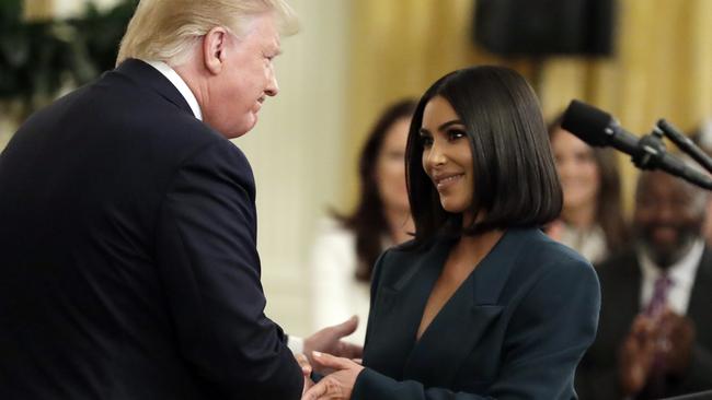 ‘I guess she’s pretty popular’: Donald Trump praises Kim Kardashian West at the White House yesterday. Picture: AP