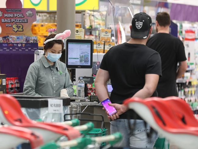 Shoppers pack in to Woolworths Skygate yesterday. Picture: Annette Dew